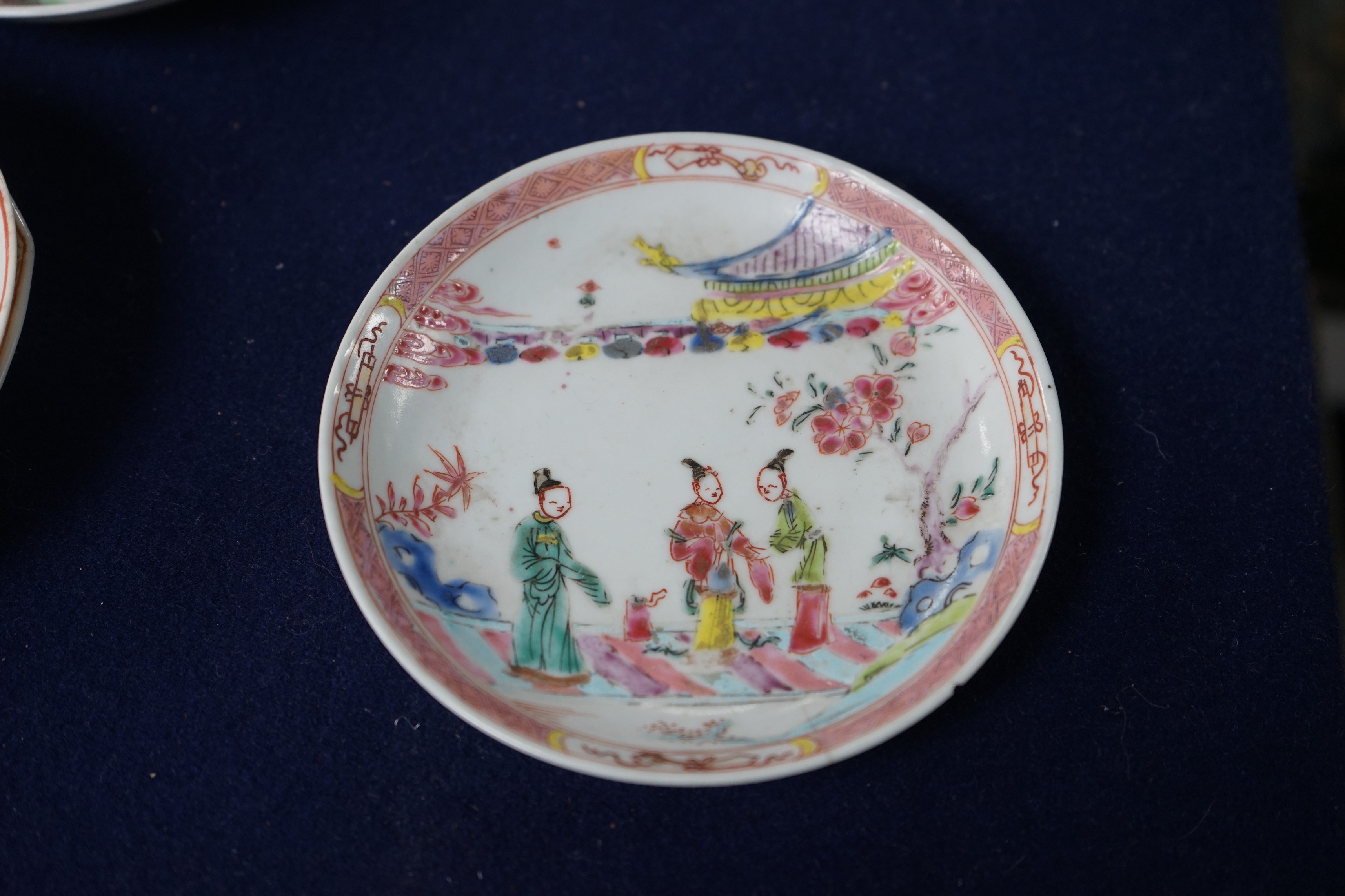A group of four 18th century Chinese export famille rose saucers